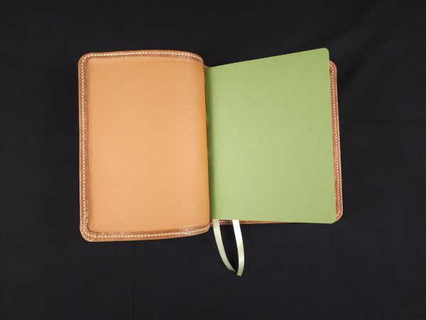 Saddle Tan Deerskin for the liner and shown is our olive green end sheets.