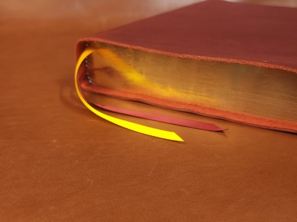 Red cowhide ESV Study Bible with two ribbons in a rugged leather style - Image 5