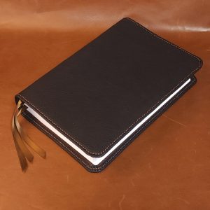 Black cowhide leather Beautiful Word Bible with brown perimeter stitch and three chocolate brown ribbons