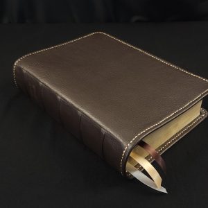 Journal The Word Bible in chocolate brown cowhide leather with tan perimeter stitching and three ribbons