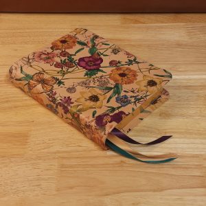 Floral sheepskin Thinline Bible with teal goatskin liner and three ribbons