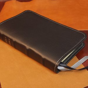 Black cowhide Thinline Bible with dark gray sheepskin liner and two ribbons