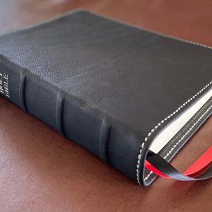 Black cowhide leather Thinline Bible with silver perimeter stitching and two ribbons
