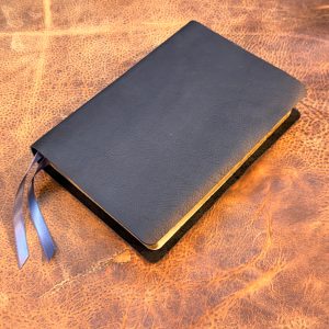 Black cowhide Thinline Bible with two ribbons in a rugged leather style