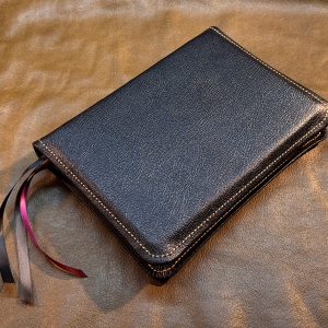 Pebbled black goatskin Thinline Bible with antiqued brown sheepskin liner and three ribbons - Capra Lux by Schaeffner Co