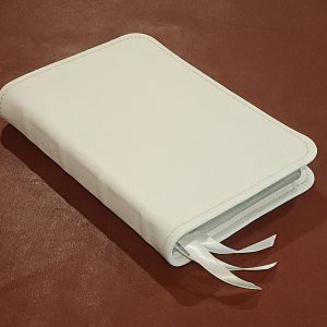 Snow white cowhide Thinline Bible with a white cowhide liner and three ribbons