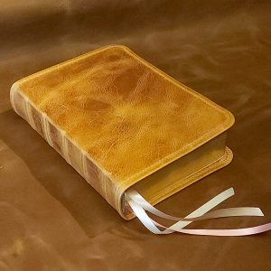 Natural tan Badalassi Carlo distressed cowhide Thinline Bible with light pink calfskin liner and three ribbons