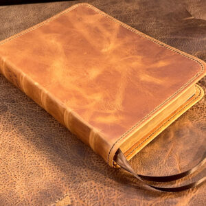 Interleaved Bible in distressed natural tan cowhide leather with walnut brown distressed cowhide liner and two ribbons