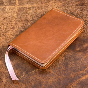 Personal Size Large Print Bible in Bible in antiqued tan sheepskin leather with light pink calfskin liner and two ribbons