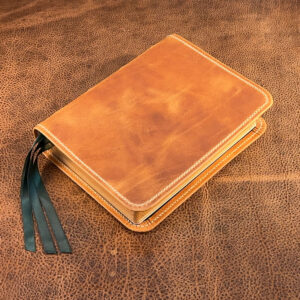 ESV Study Bible in natural tan distressed cowhide leather with a smooth hunter green calfskin liner and three ribbons