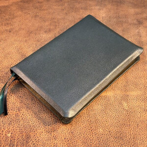 ESV Study Bible in pebbled hunter green goatskin leather with antique black sheepskin liner and two ribbons - Capra Lux by Schaeffner Co