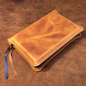 ESV Study Bible in distressed natural tan cowhide leather with blue two-tone distressed goatskin liner and three ribbons - Capra Lux by Schaeffner Co